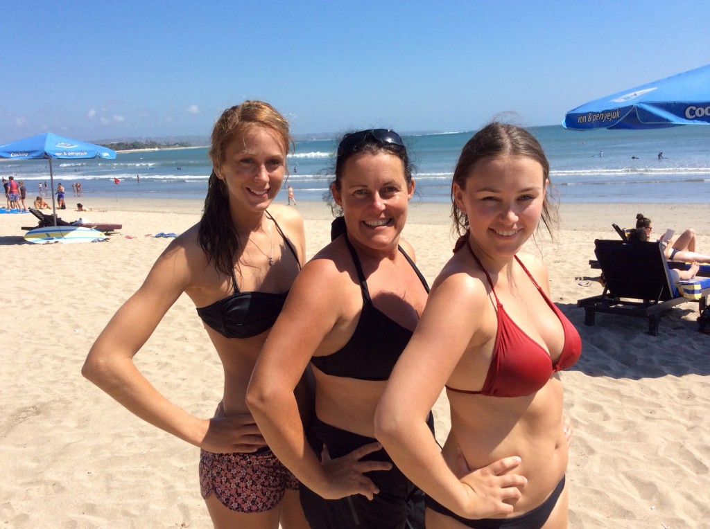 Hiding between two Gorgeous Beach Babes