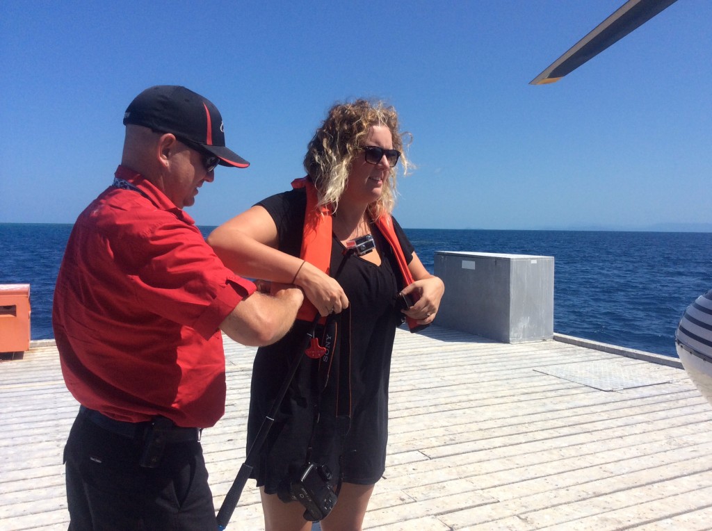 Casey helps her with the lifejacket as she informs him she has her own set of "buoyancy aids"